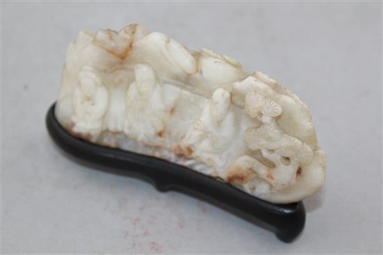 A Chinese white and russet bowenite jade mountain, 20th century, 11.5cm, wood stand
